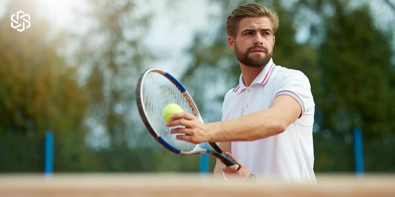 Active man playing tennis representing peptide therapy supporting energy, recovery, and metabolic health in men
