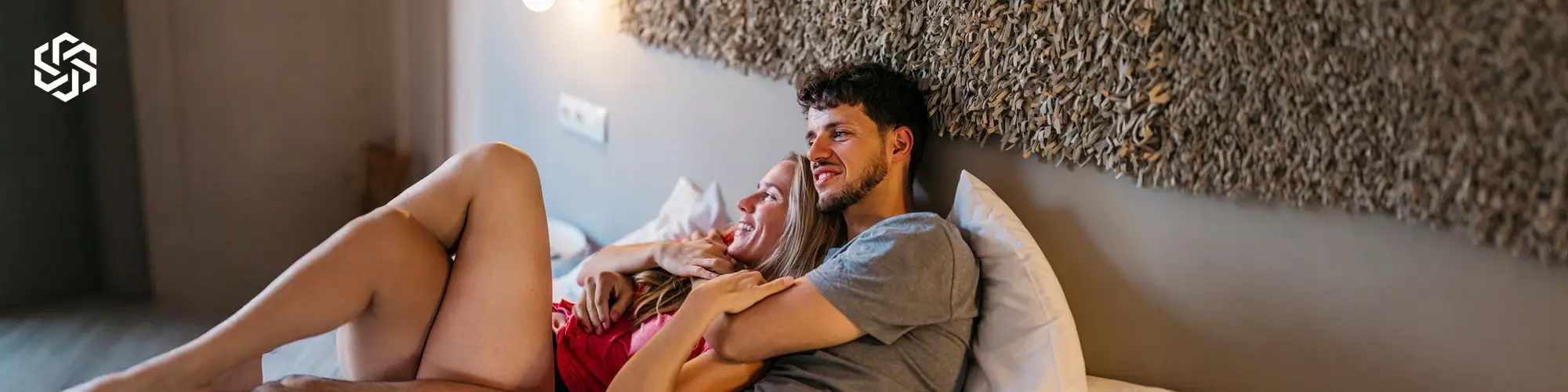 Couple relaxing together, representing comfort, confidence, and pelvic and sexual health