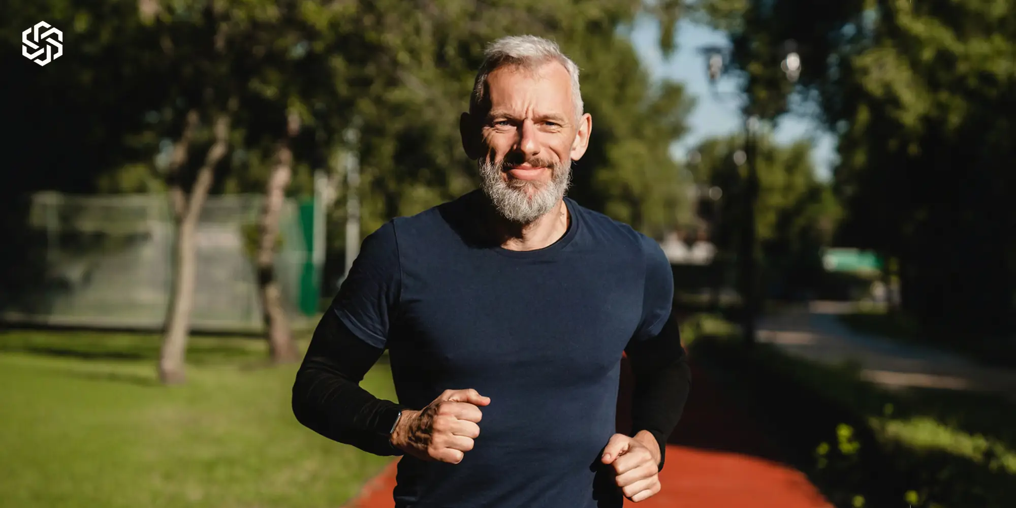 Active midlife man jogging outdoors representing testosterone replacement therapy and men’s hormone health.