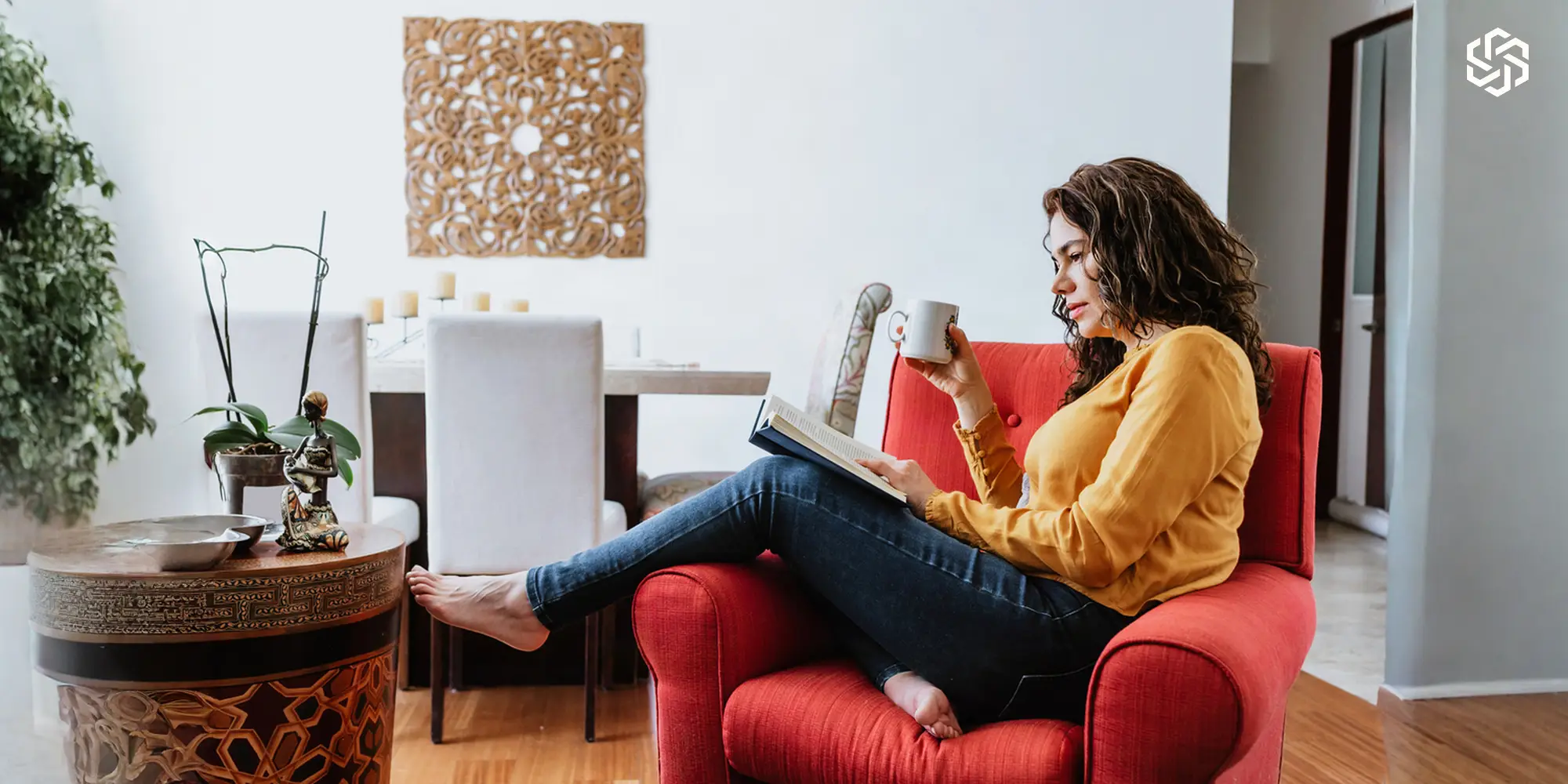 Midlife woman relaxing at home while receiving personalized hormone replacement therapy support.
