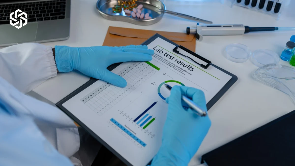 Lab professional reviewing test results against the normal range