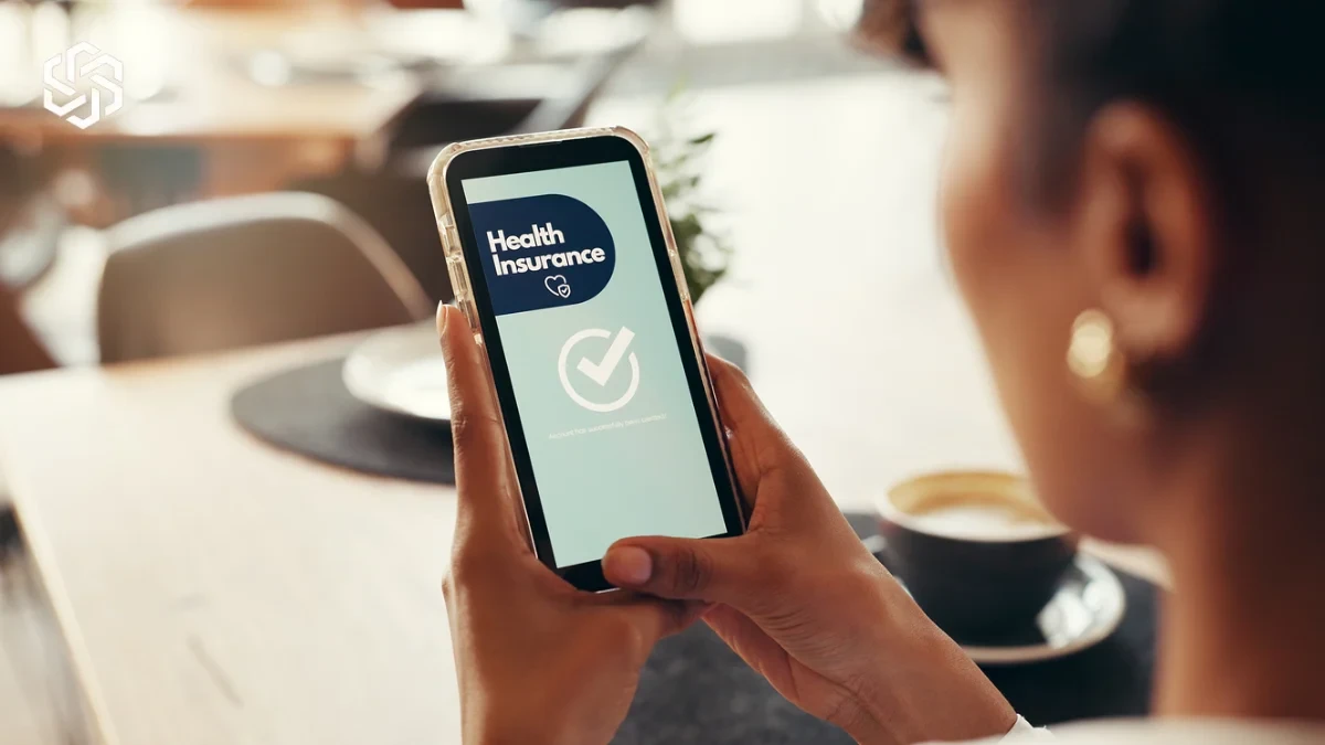 Person checking health insurance approval on a phone