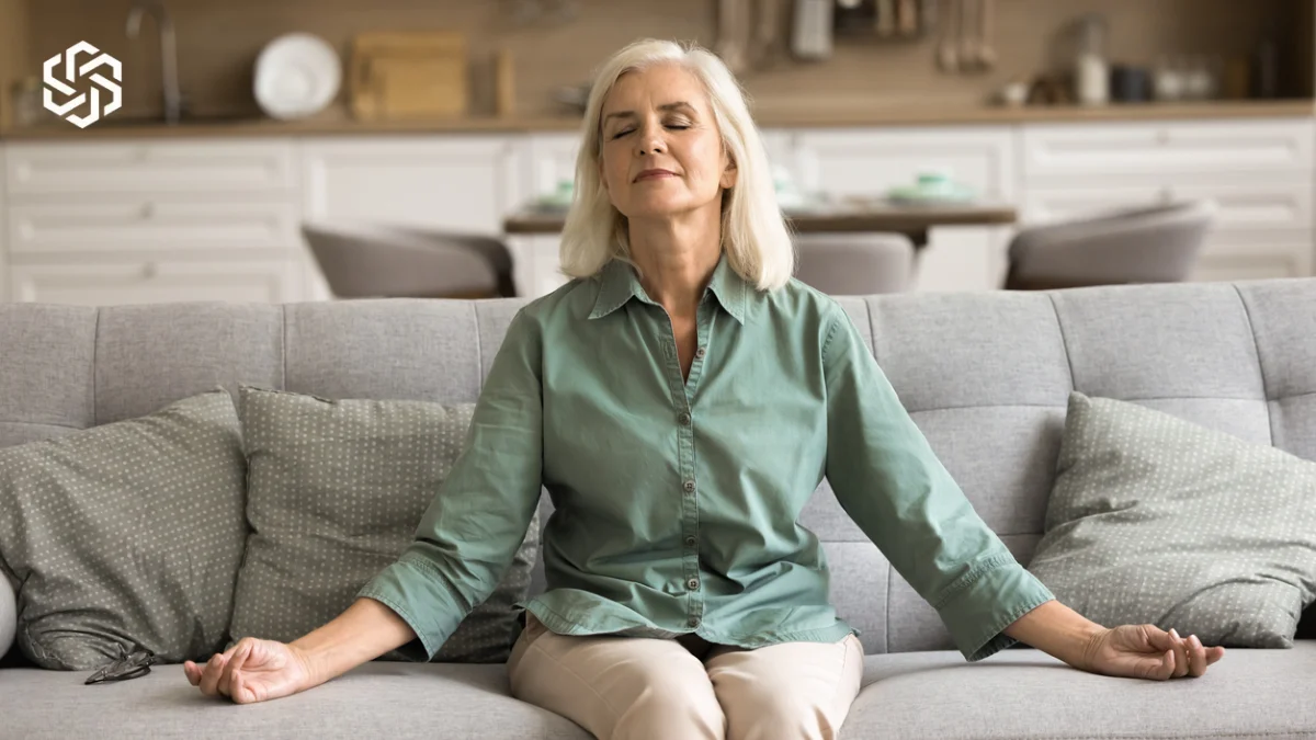 Woman meditating on the couch