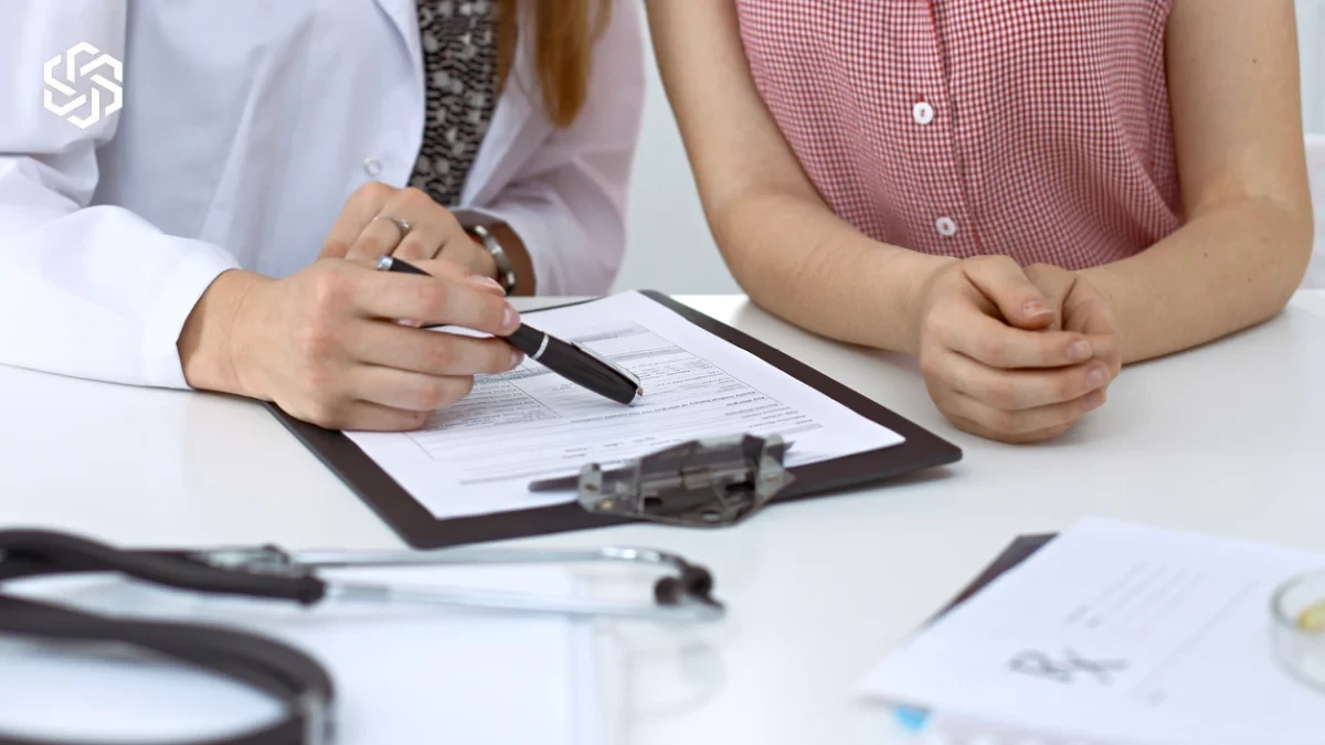 Provider reviewing medical history with a patient