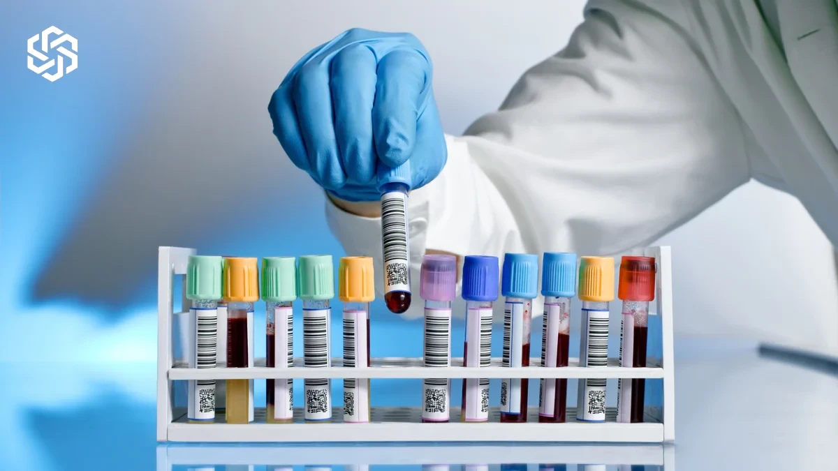 Lab technician holding a blood sample tube for preventive care lab tests
