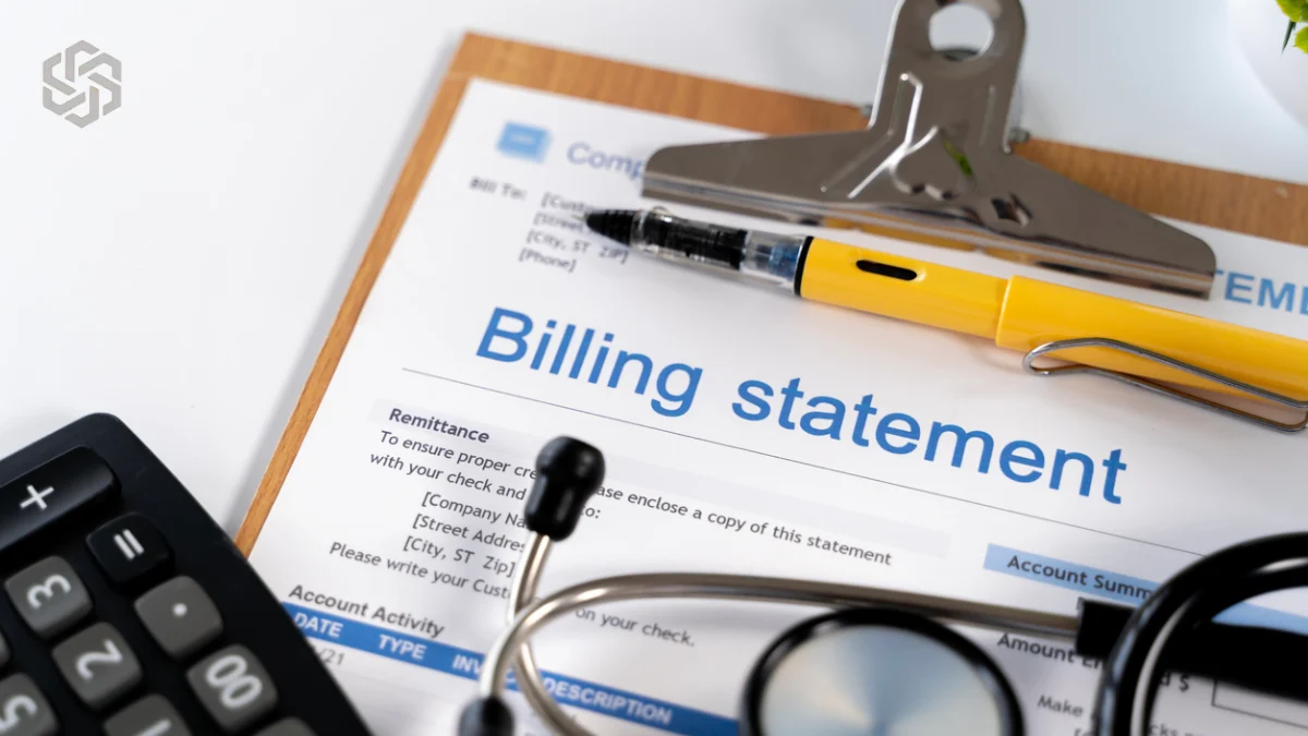 Medical billing statement on a clipboard with a stethoscope and calculator