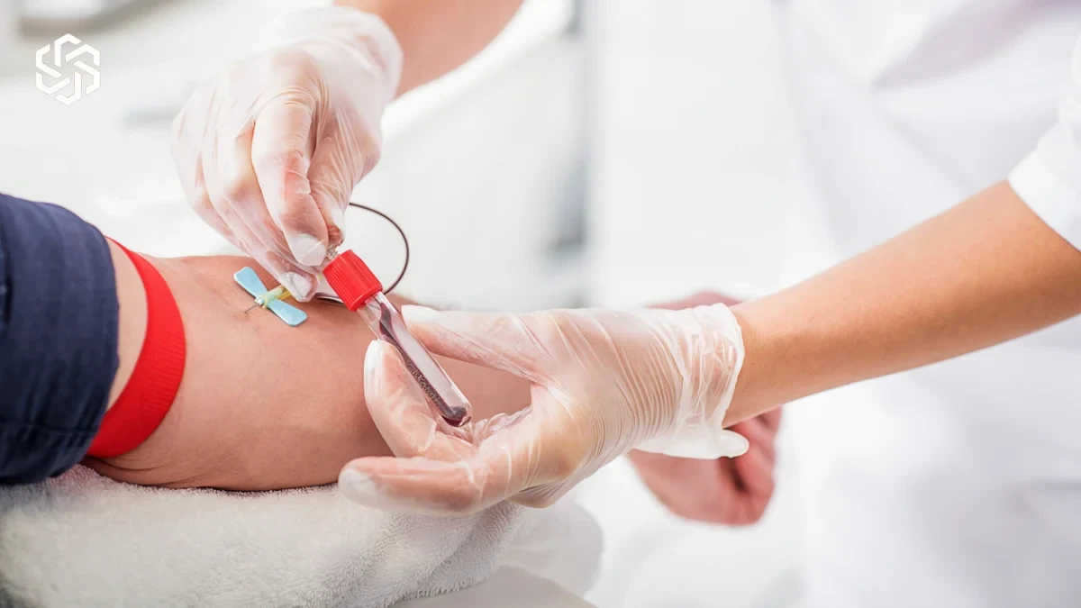 Provider drawing a patient's blood