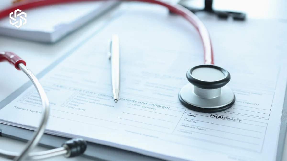 Medical form with a pen and stethoscope