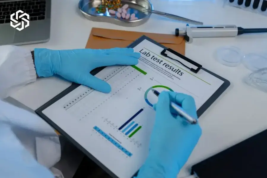 Lab professional reviewing test results