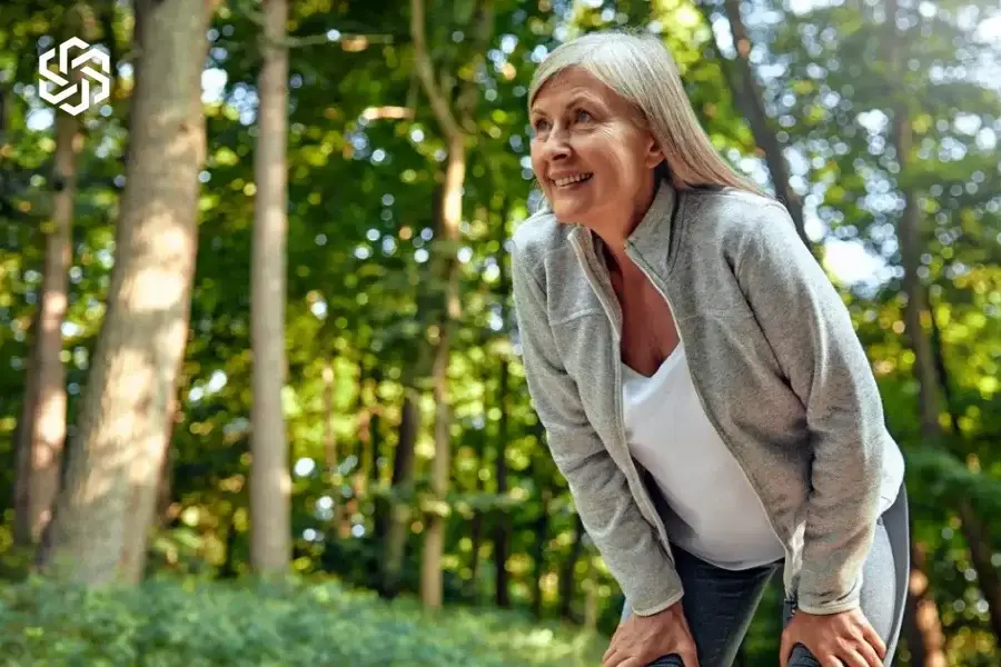 Woman taking a break during an outdoor walk